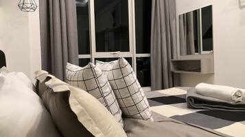 Blackout curtains, iron/ironing board, free WiFi, bed sheets