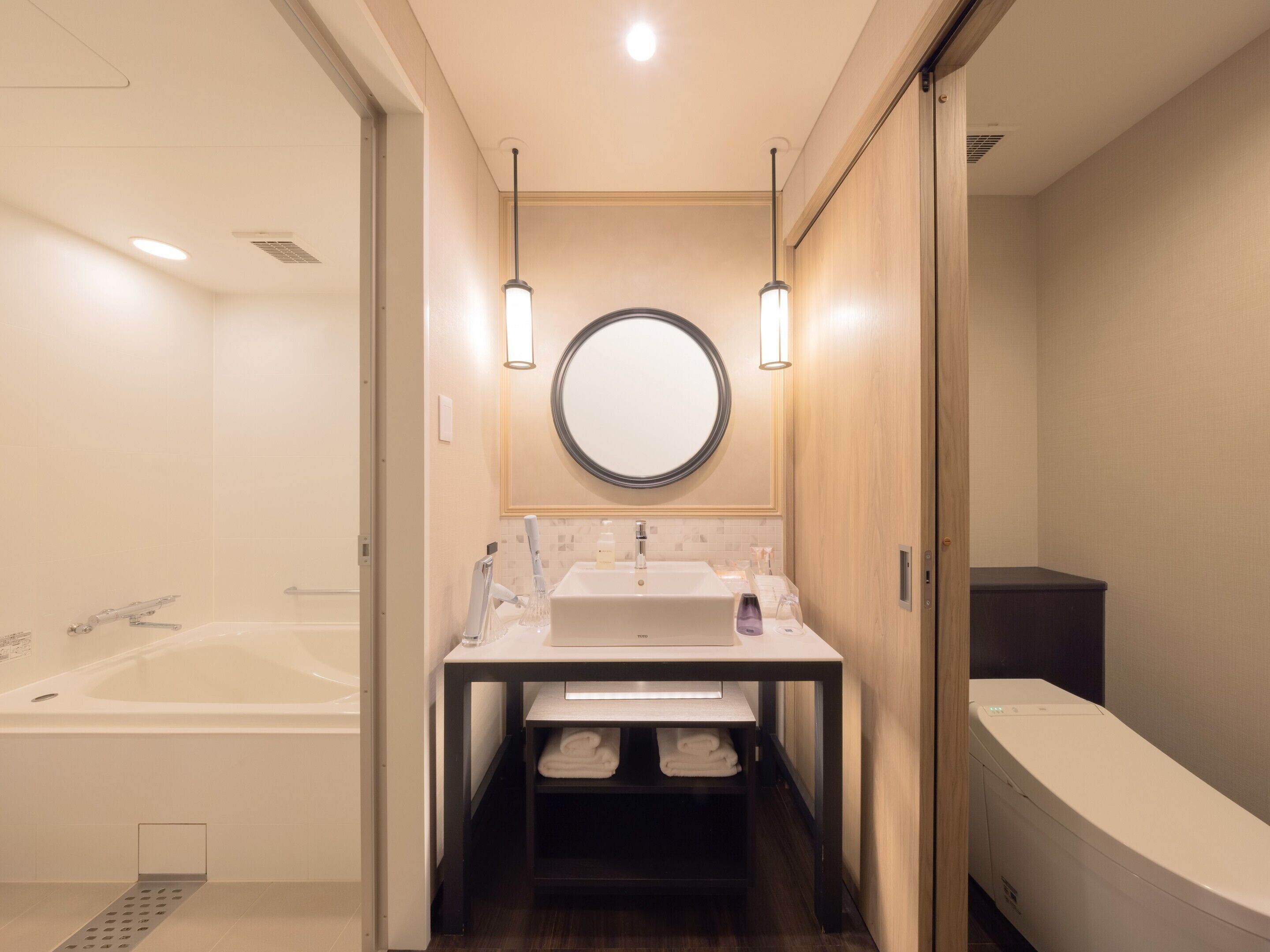 free toiletries, hair dryer, slippers, bidet