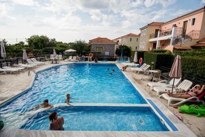 Seasonal outdoor pool, open 8:30 AM to 7:00 PM, pool umbrellas - Christina's Garden (Lesvos)