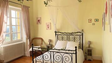 Family Room, Garden View | Down comforters, memory foam beds, individually decorated