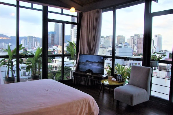 Deluxe Loft, City View | Minibar, desk, blackout drapes, free WiFi