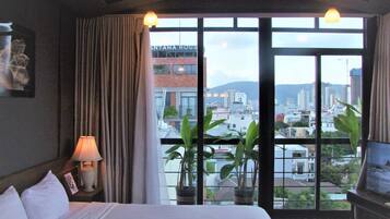 Deluxe Loft, City View | Minibar, desk, blackout drapes, free WiFi