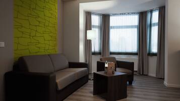Superior Apartment | Living area | Flat-screen TV, offices