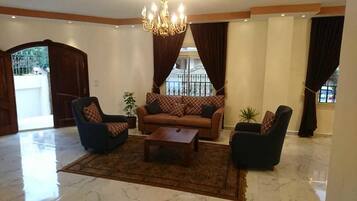Villa, 3 Bedrooms | Living room | 55-inch flat-screen TV with satellite channels, TV
