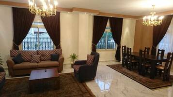 Villa, 3 Bedrooms | Living room | 55-inch flat-screen TV with satellite channels, TV