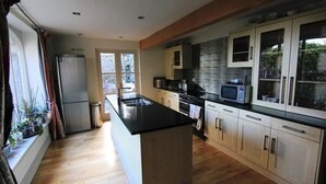 Full-sized fridge, microwave, oven, dishwasher