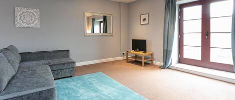 Basic Apartment, 2 Bedrooms, Non Smoking | Living area | Flat-screen TV