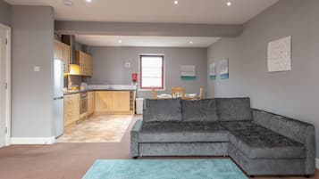 Basic Apartment, 2 Bedrooms, Non Smoking | Living area | Flat-screen TV