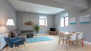 24-inch flat-screen TV with digital channels, TV, Netflix