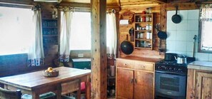 Fridge, oven, coffee/tea maker, cookware/dishes/utensils