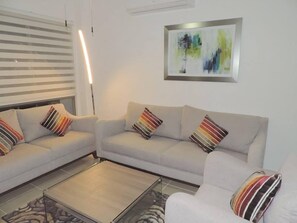 House, Non Smoking | Living room | Flat-screen TV - Villa Zamá by Akua (Playa del Carmen)