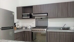 House, Non Smoking | Private kitchen | Coffee/tea maker, full-size fridge, microwave, oven