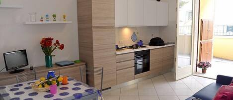 Apartment, 2 Bedrooms | Private kitchenette | Full-size fridge, oven, stovetop, cookware/dishes/utensils