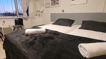 Classic Quadruple Room, Shared Bathroom | Blackout drapes, free WiFi, bed sheets