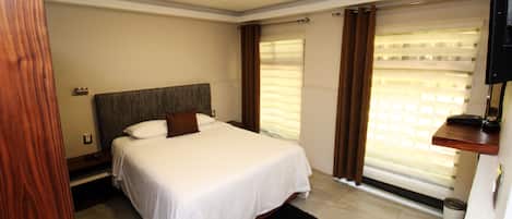 Executive Suite, 2 Double Beds, Non Smoking | Blackout drapes, soundproofing, iron/ironing board, free WiFi