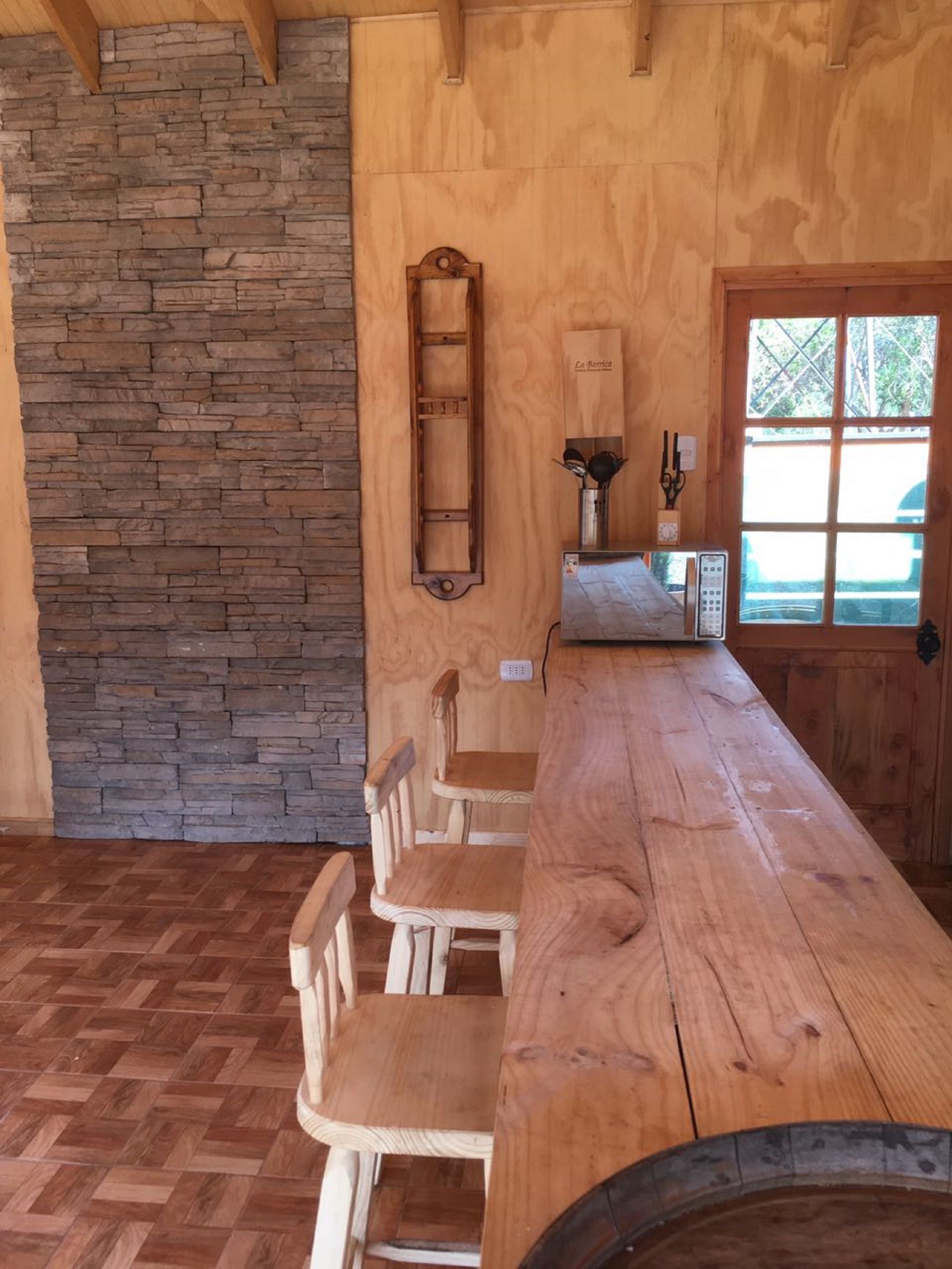Deluxe-Haus, Mehrere Betten, barrierefrei, Gartenblick | Essbereich im Zimmer