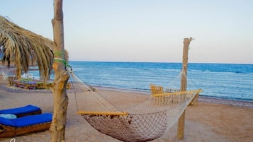 Private beach, free beach cabanas, sun loungers, beach umbrellas
