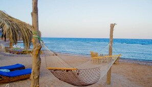 Private beach, free beach cabanas, sun-loungers, beach umbrellas