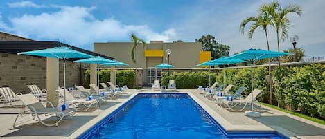 Outdoor pool, open 8:00 AM to 8:00 PM, pool umbrellas, pool loungers