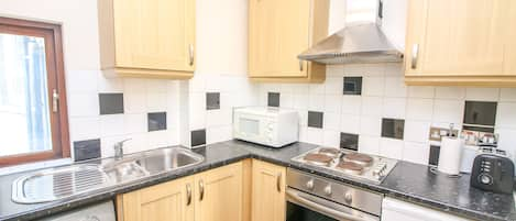 Apartment, 1 Double Bed with Sofa bed | Private kitchenette | Full-sized fridge, microwave, oven, stovetop