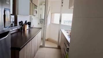 Fridge, oven, stovetop, cookware/dishes/utensils