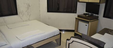 Habitación clásica | Insonorización, tabla de planchar con plancha y camas extra