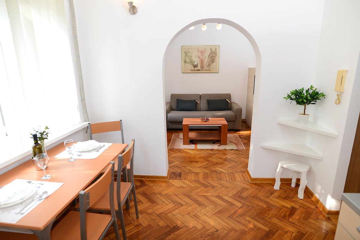 City Apartment, 1 Bedroom, Kitchen | Living area | LCD TV