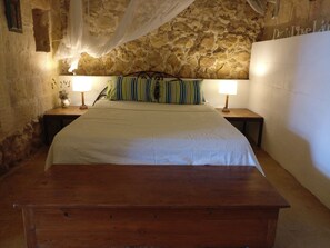 1 bedroom, desk, iron/ironing board, travel crib