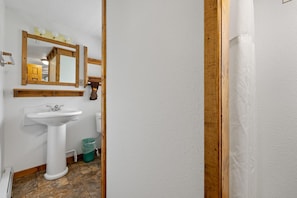 Bathtub, hair dryer, towels