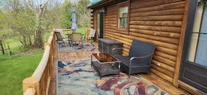 Outdoor dining - Secluded Riverside Log Home in Southern Michigan (Centreville)