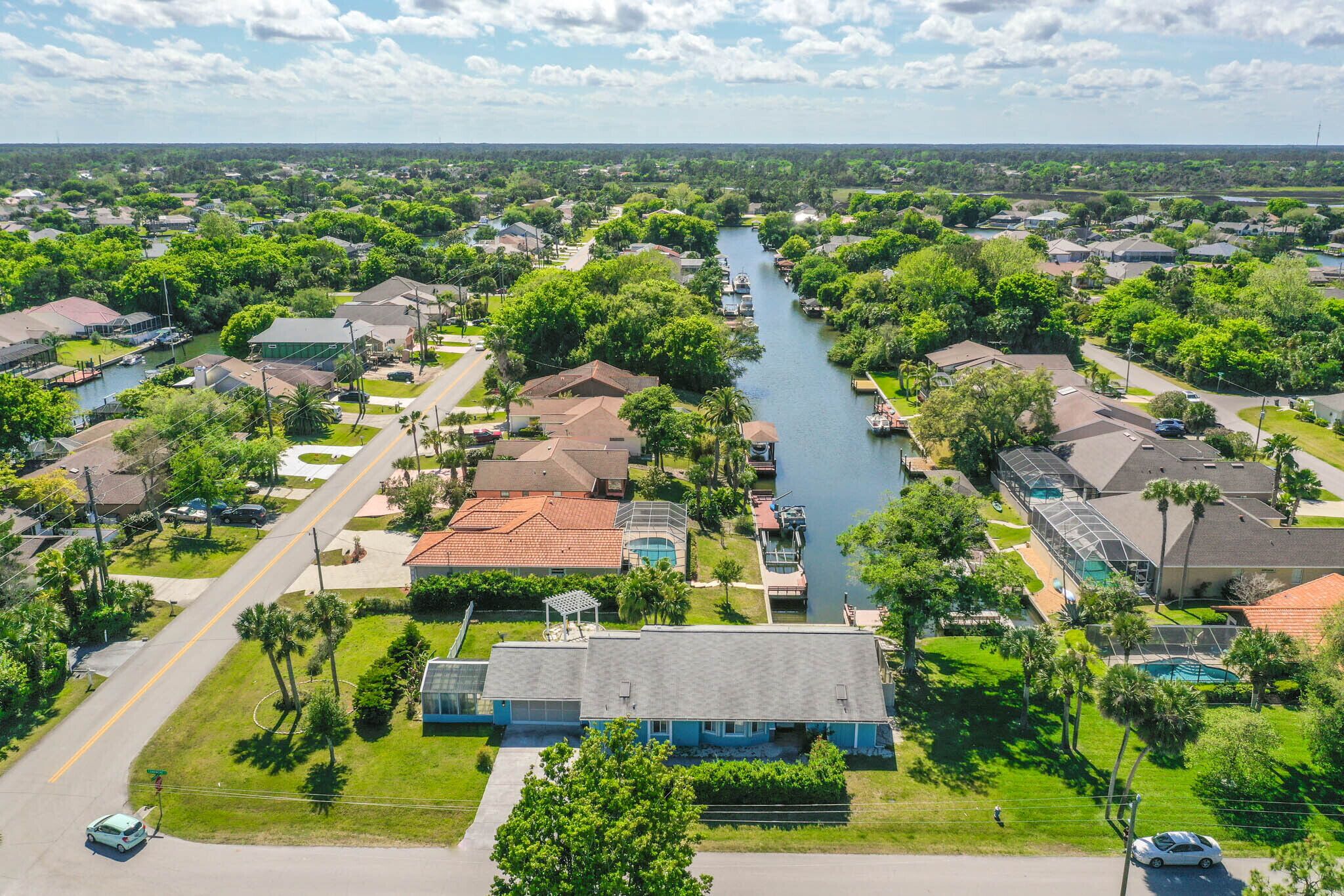 Canal Waterfront House 3br/4ba Pet-friendly XL fenced yard/Boat Dock/Ocean/golf