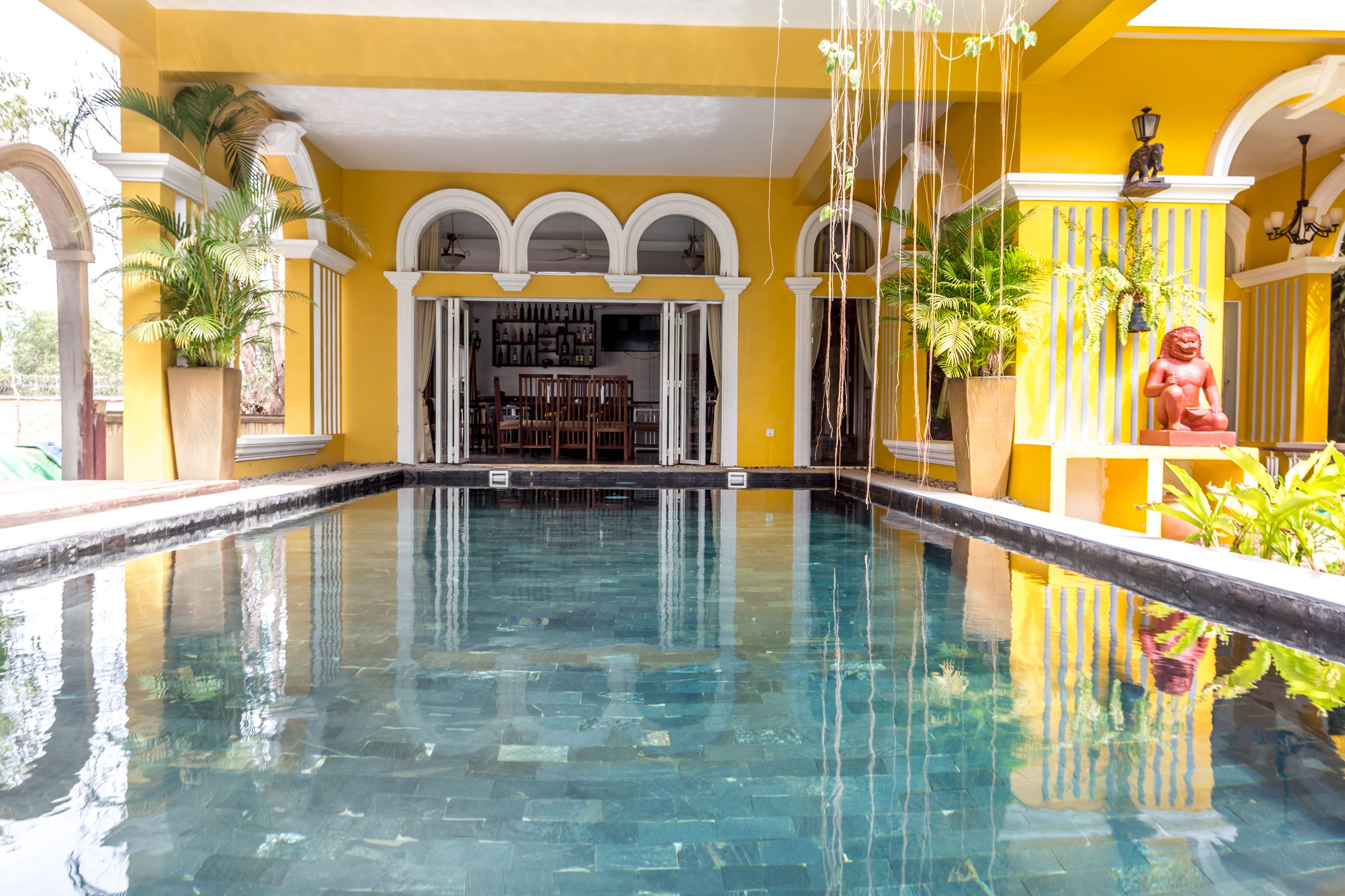 indoor pool, open 6:00 am to 10:30 pm, pool umbrellas, pool loungers