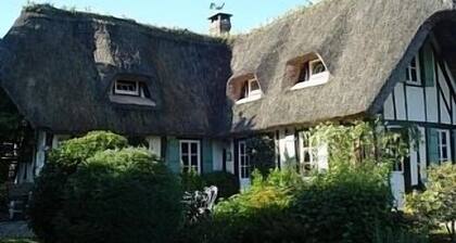 Thatched Cottage on the Banks of the Seine