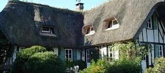 Thatched Cottage on the Banks of the Seine