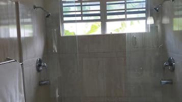 Bathtub, hair dryer, towels, soap
