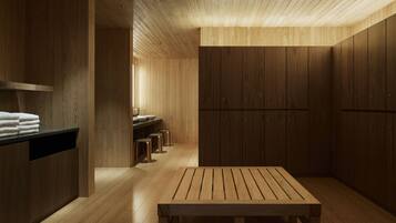 A wooden interior with a bench, wooden cabinets, and a sink area.