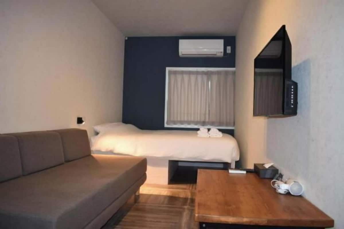 Hypo-allergenic bedding, desk, blackout drapes, soundproofing