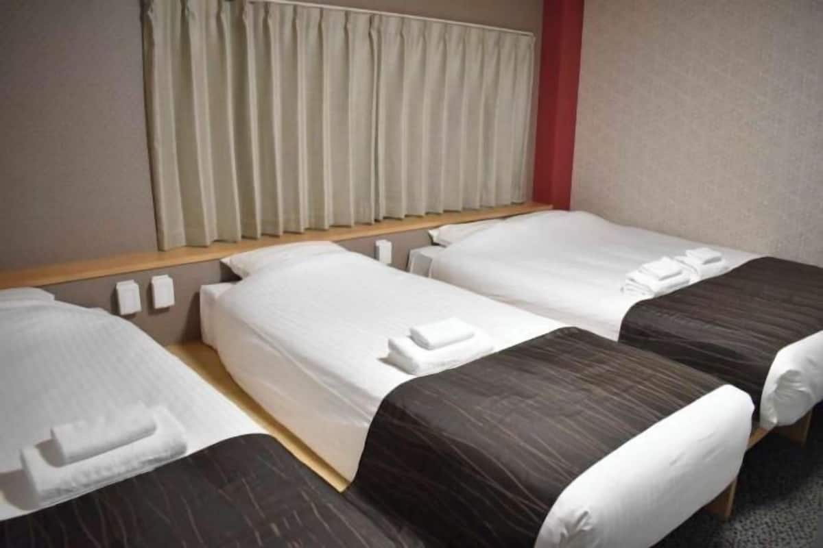 Hypo-allergenic bedding, desk, blackout drapes, soundproofing