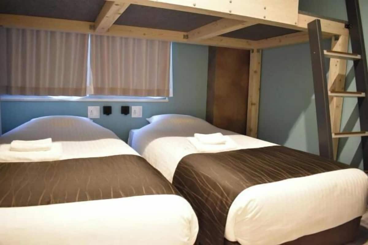 Hypo-allergenic bedding, desk, blackout drapes, soundproofing