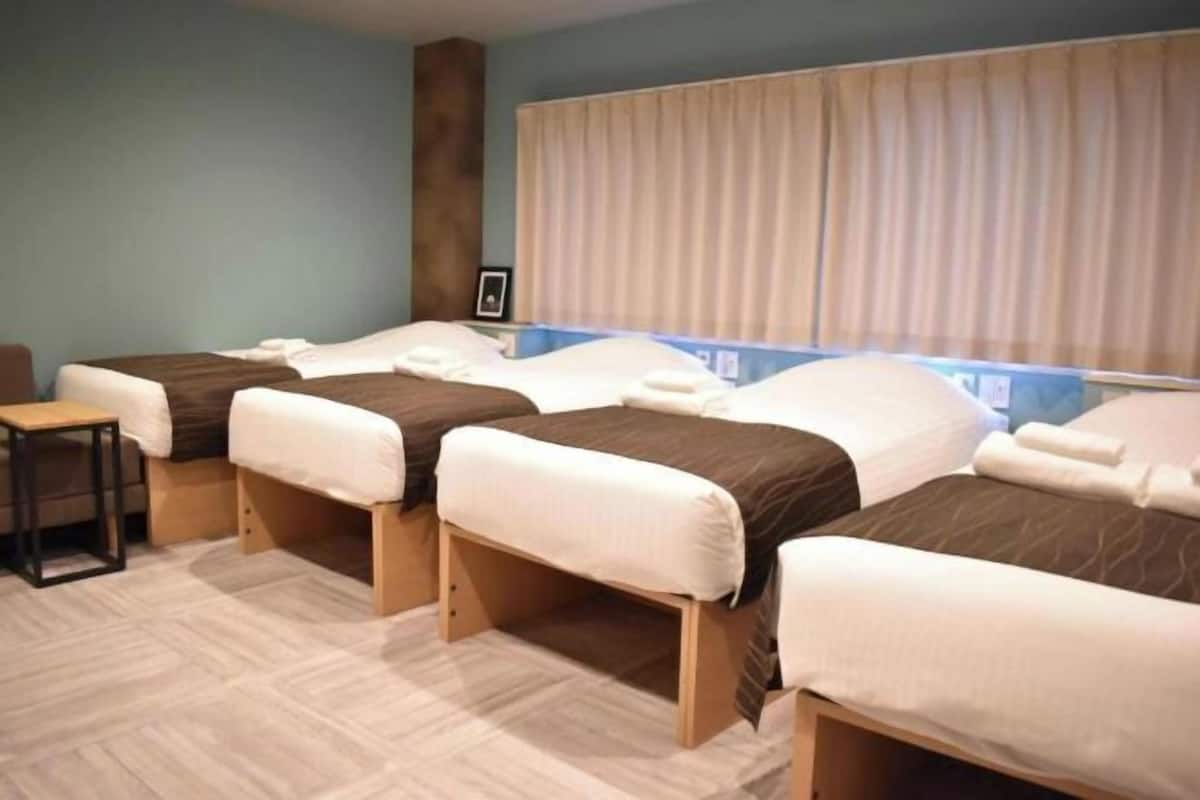 Hypo-allergenic bedding, desk, blackout drapes, soundproofing