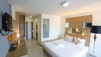 Desk, laptop workspace, blackout drapes, rollaway beds