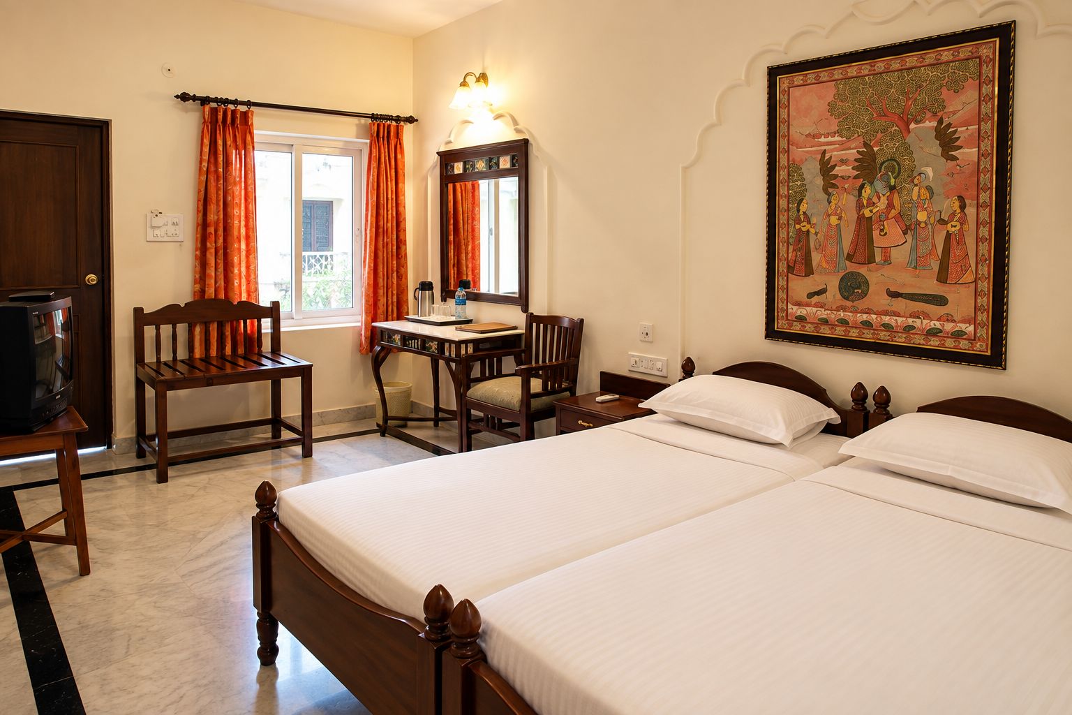 A hotel room with two beds, a desk, a chair, a television, and a painting on the wall.
