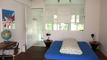 Individually decorated, individually furnished, desk, rollaway beds