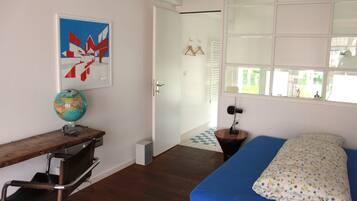 Individually decorated, individually furnished, desk, rollaway beds