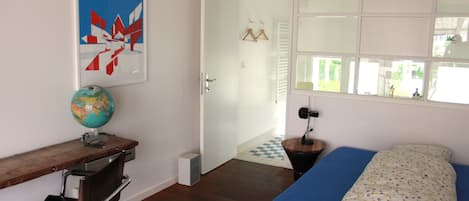 Individually decorated, individually furnished, desk, rollaway beds