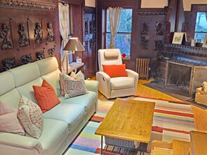 Smart TV, fireplace, foosball, books