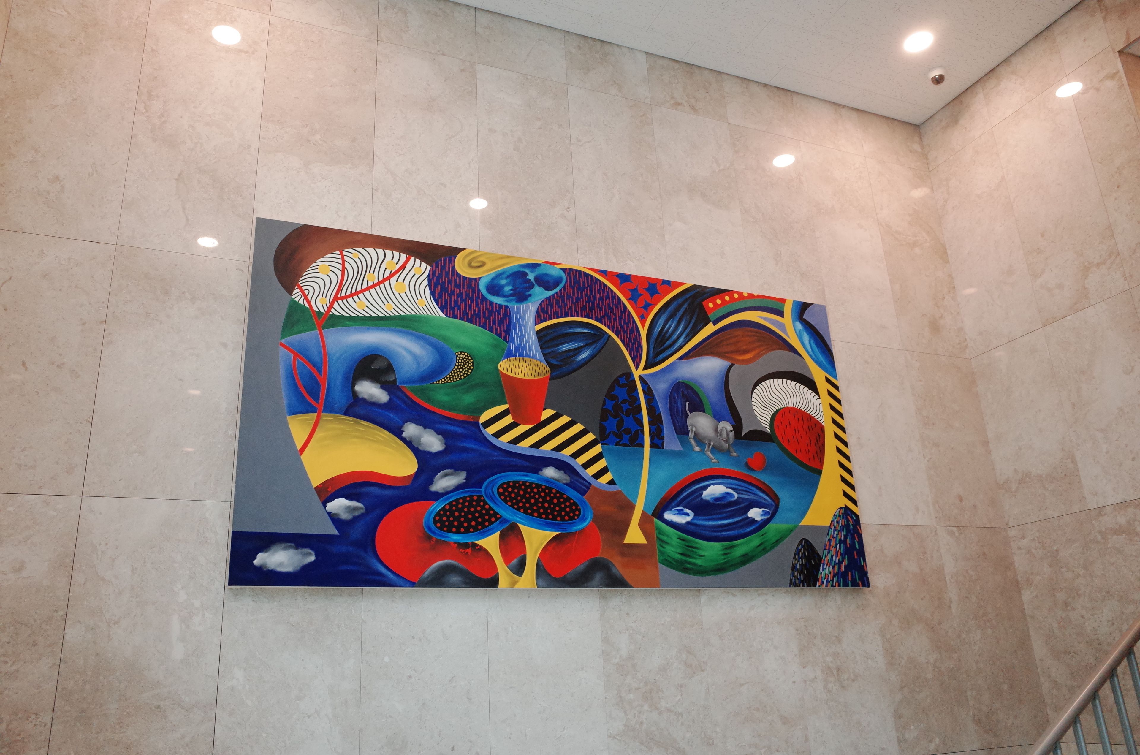 A colorful abstract mural on a wall.