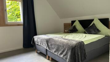 Premium bedding, individually decorated, individually furnished, desk