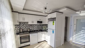Villa | Private kitchenette | Full-sized fridge, oven, stovetop, dishwasher - Villa Frezya by Villamnet (Fethiye)
