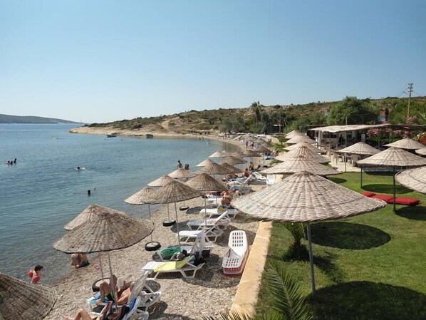 Private beach, sun loungers, beach umbrellas
